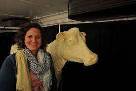 A photo of Sarah Pratt and the butter cow
