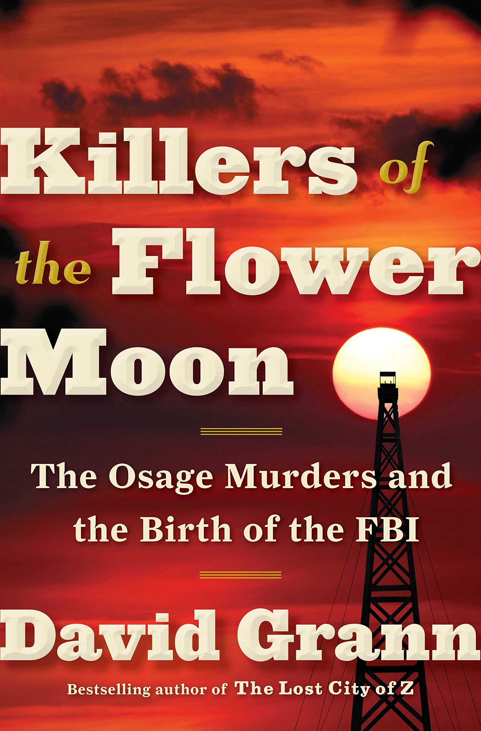 Cover of Killers of the Flower Moon. An oil tower is in front of a full moon and a red/orange sky.