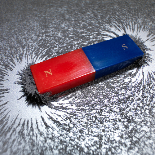 magnet surrounded by metal filings