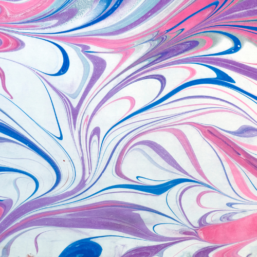 marbled paper pattern in blue, pink, white, and purple