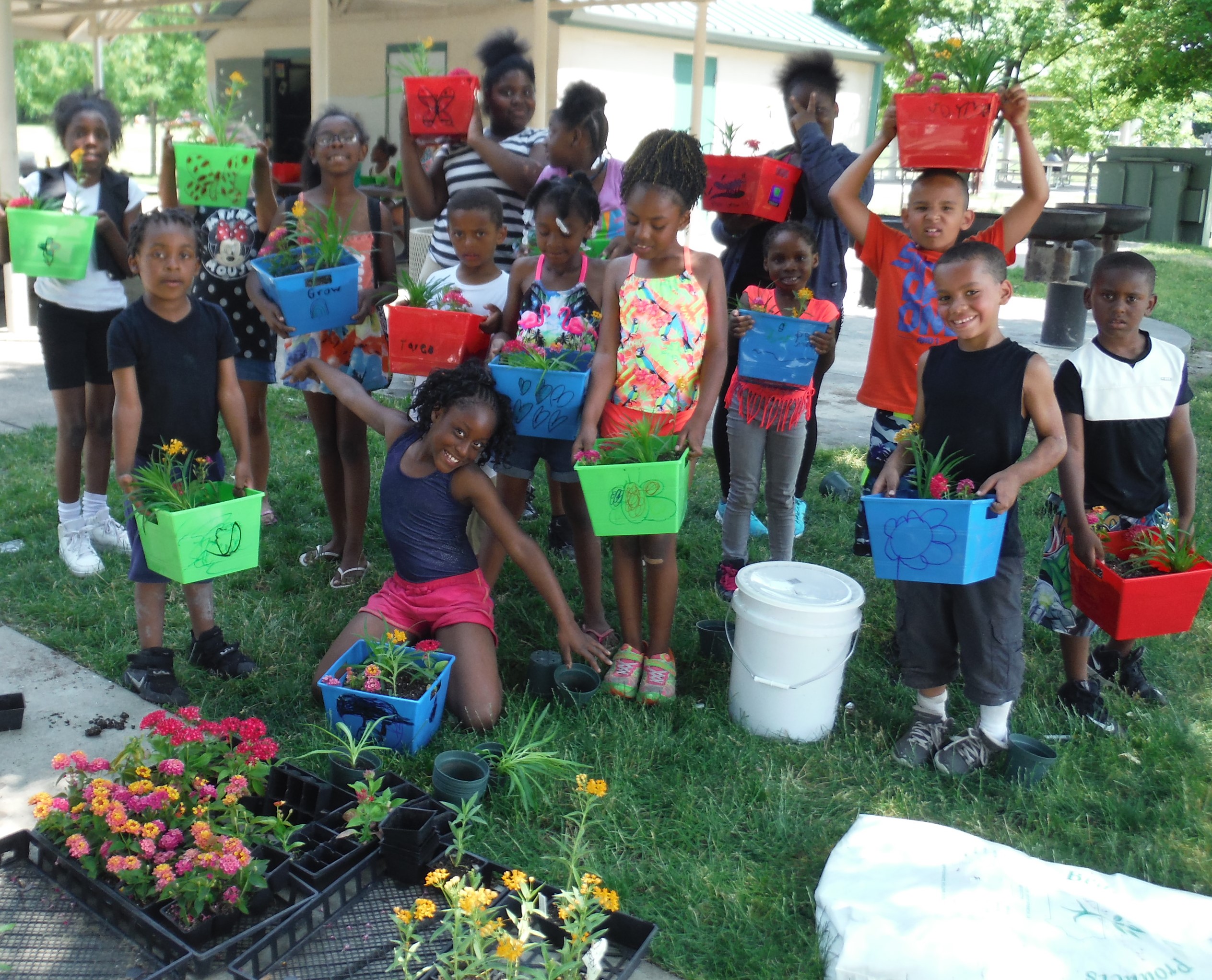 kids with flowerpots