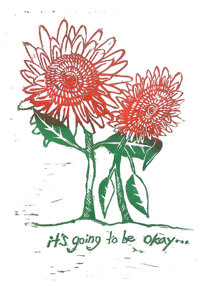 A linoleum print of two sunflowers with the text "it's going to be okay..."