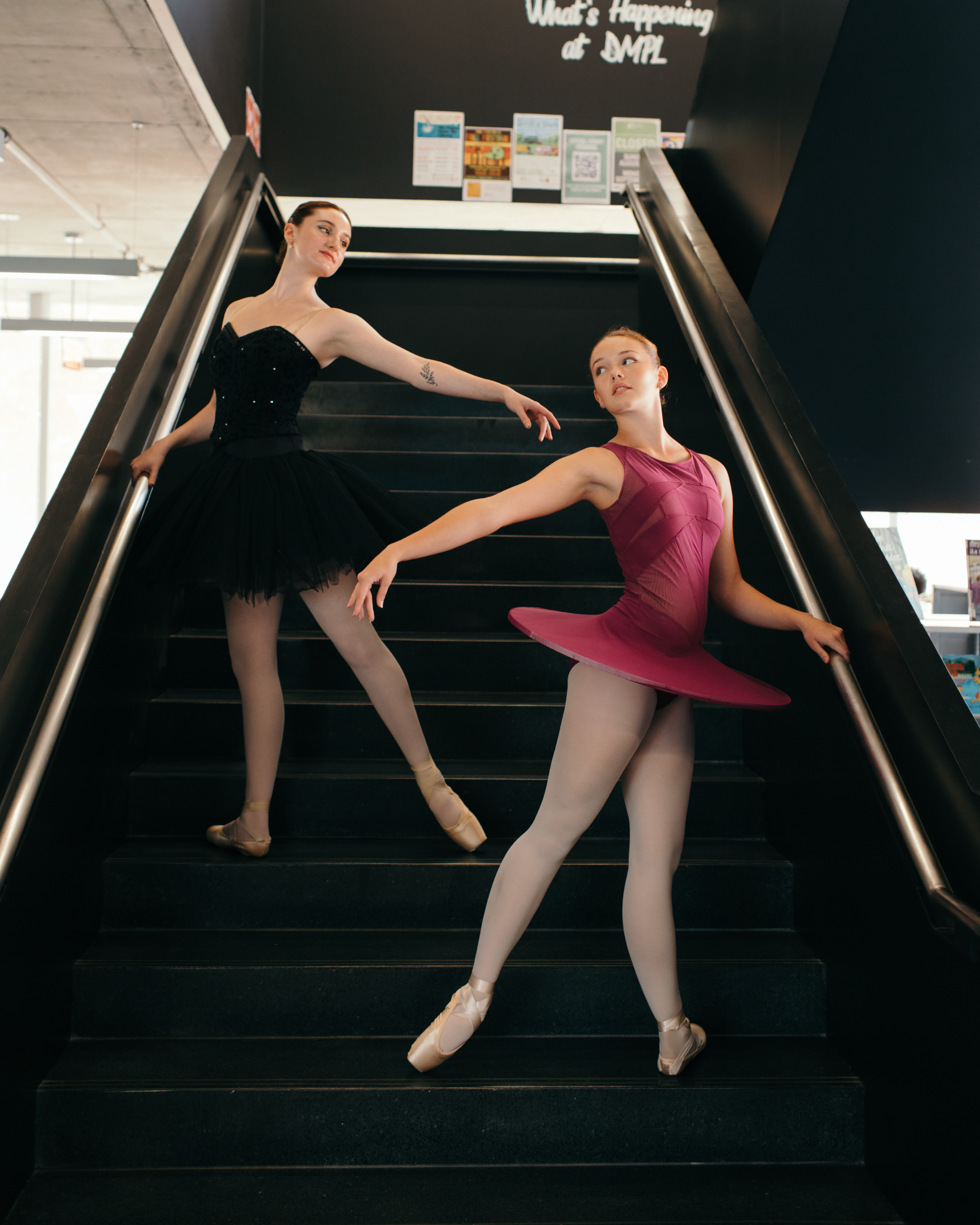 Ballerinas on the stairs at Central Library
