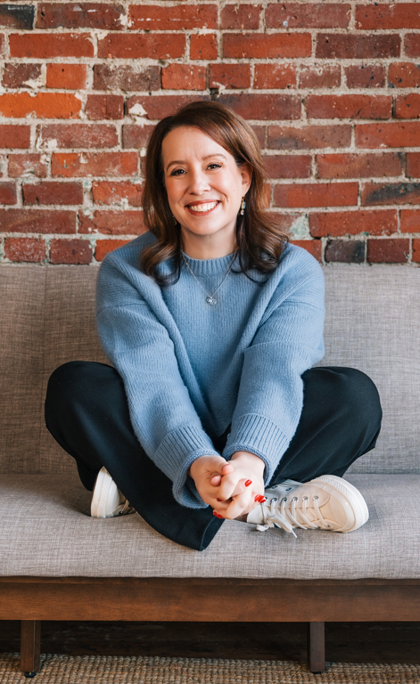 Julia Quinn on a couch