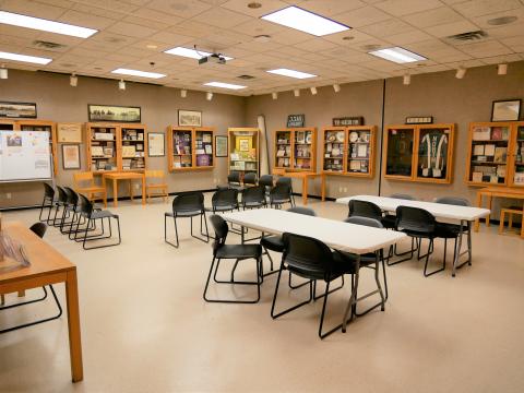 North Side Library Meeting Room with rectangular tables and accompanying chairs