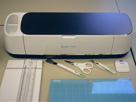 Cricut machine with scissors and other small tools, cutting pad