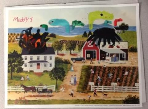 Photo of an art print with monsters painted on it