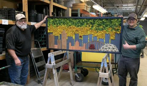 McMahon (R) stands with his piece