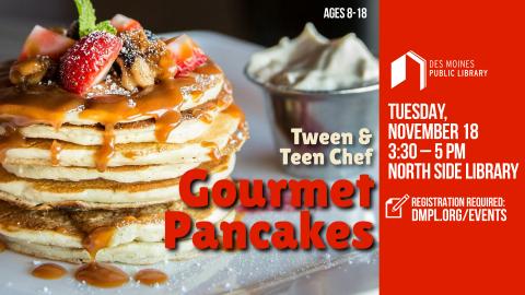 Stack of pancakes topped with syrup and fruit