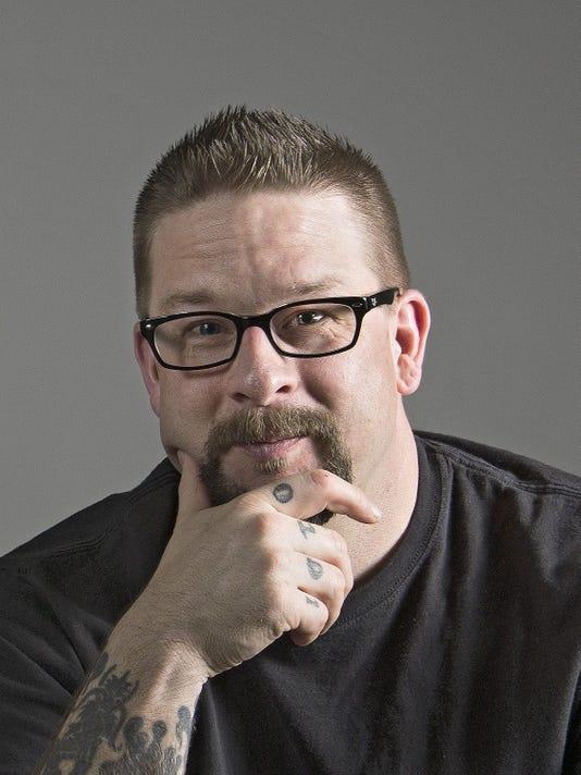 Photo of Kevin Gannon, aka The Tattooed Professor