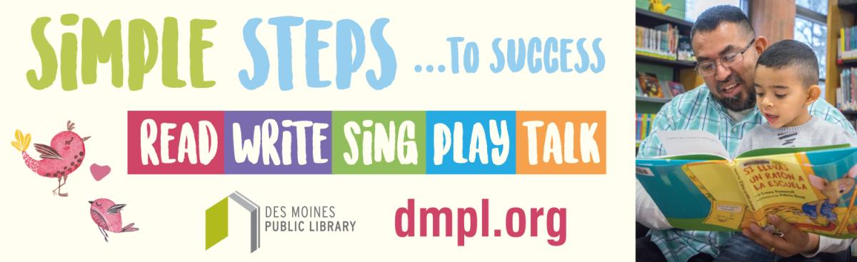 Dad reading with son