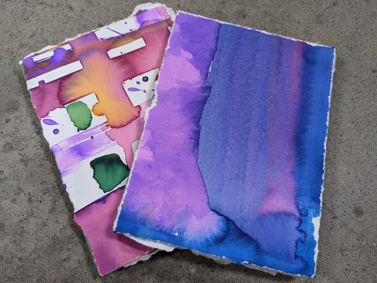 two watercolor books with different designs