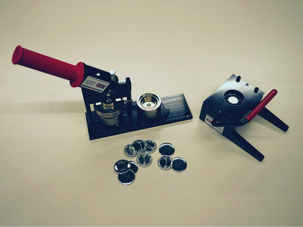 Industrial-looking button press, with blank buttons