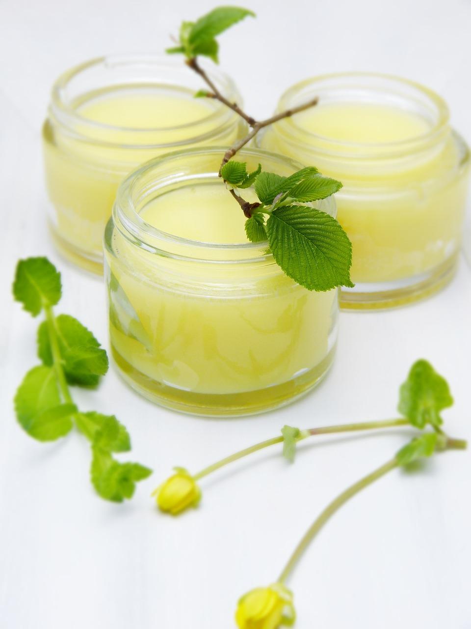 Glass Jars filled with a yellow scrub