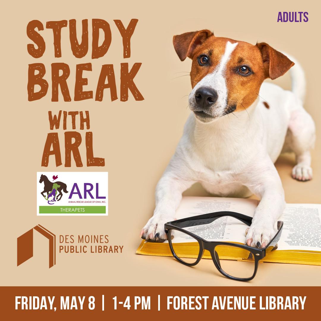 Dog laying on an open book.